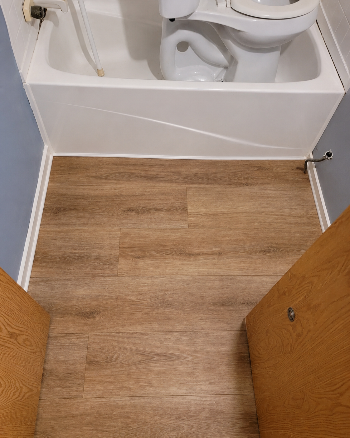 Finished bathroom flooring after subfloor repair