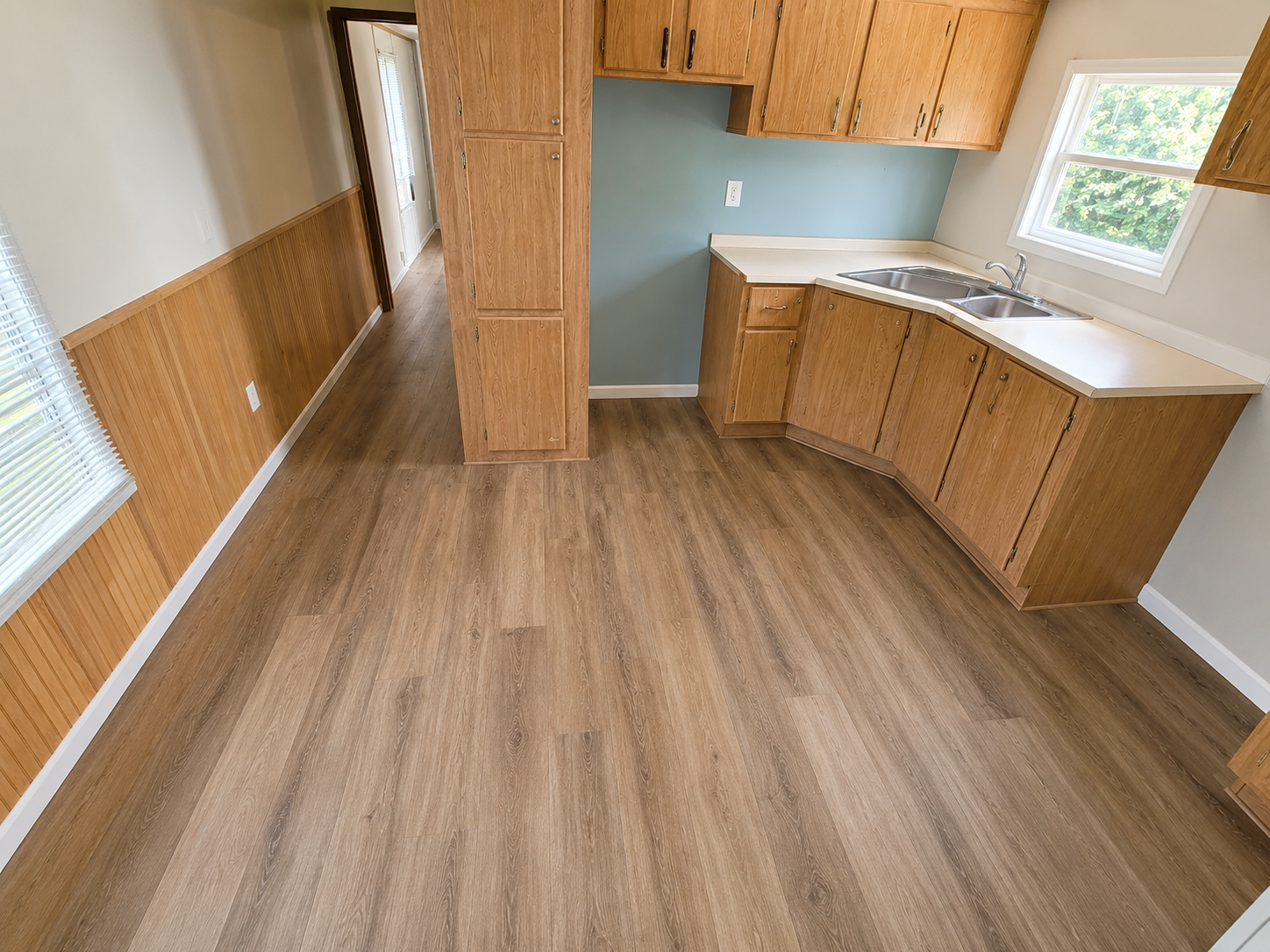 Restored kitchen with finished flooring